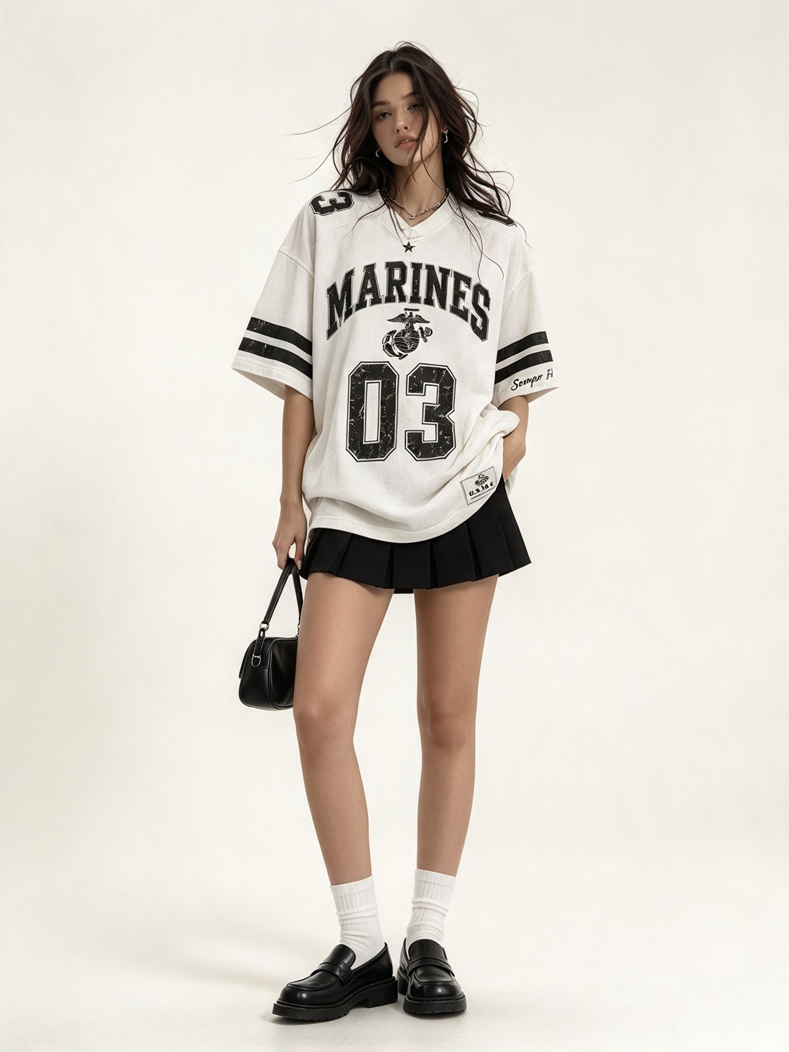 Oversized football jersey with a pleated skirt